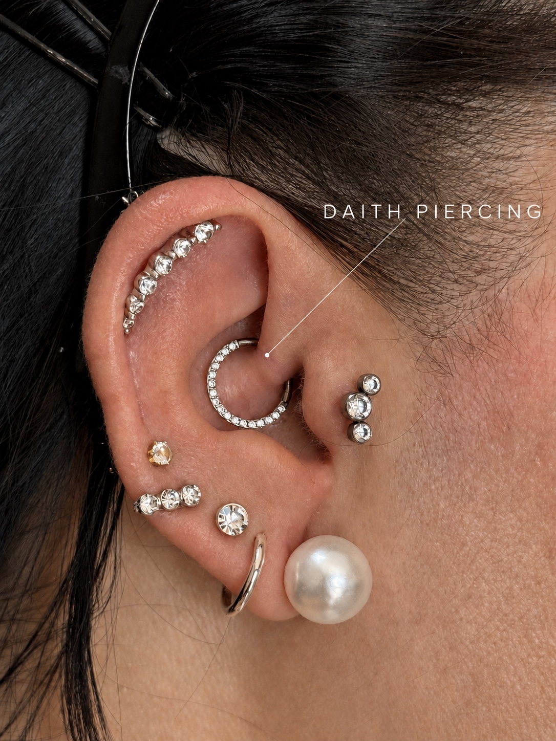 Daith piercing and ear composition